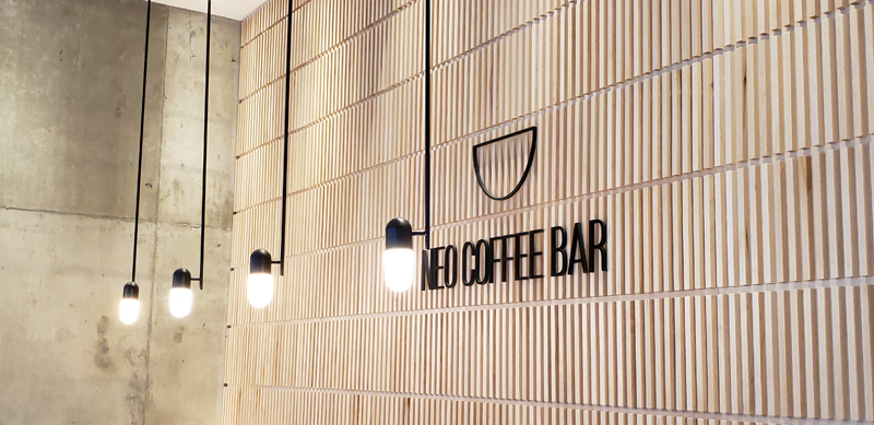 Neo Coffee Bar wall with logo name